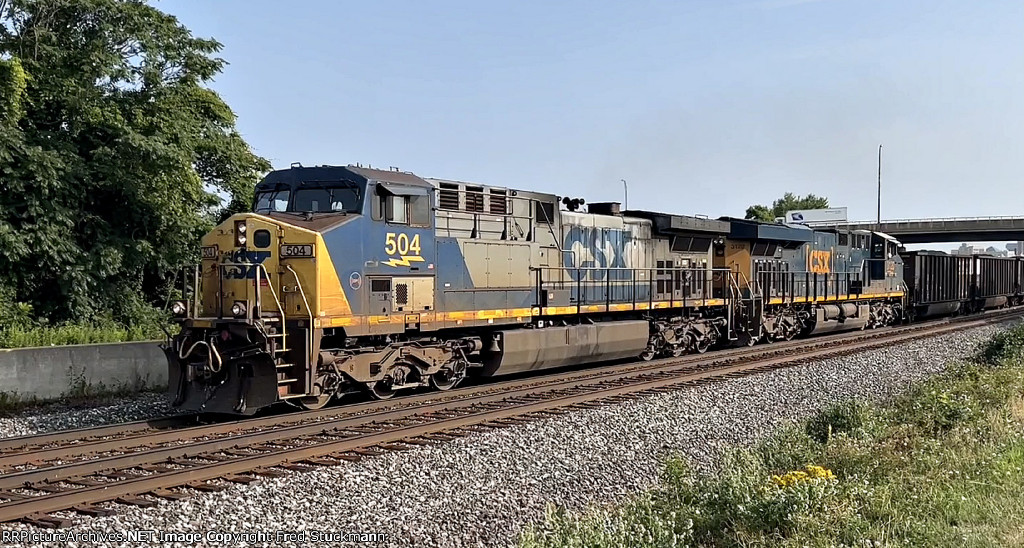 CSX 504 leads loaded coal west.